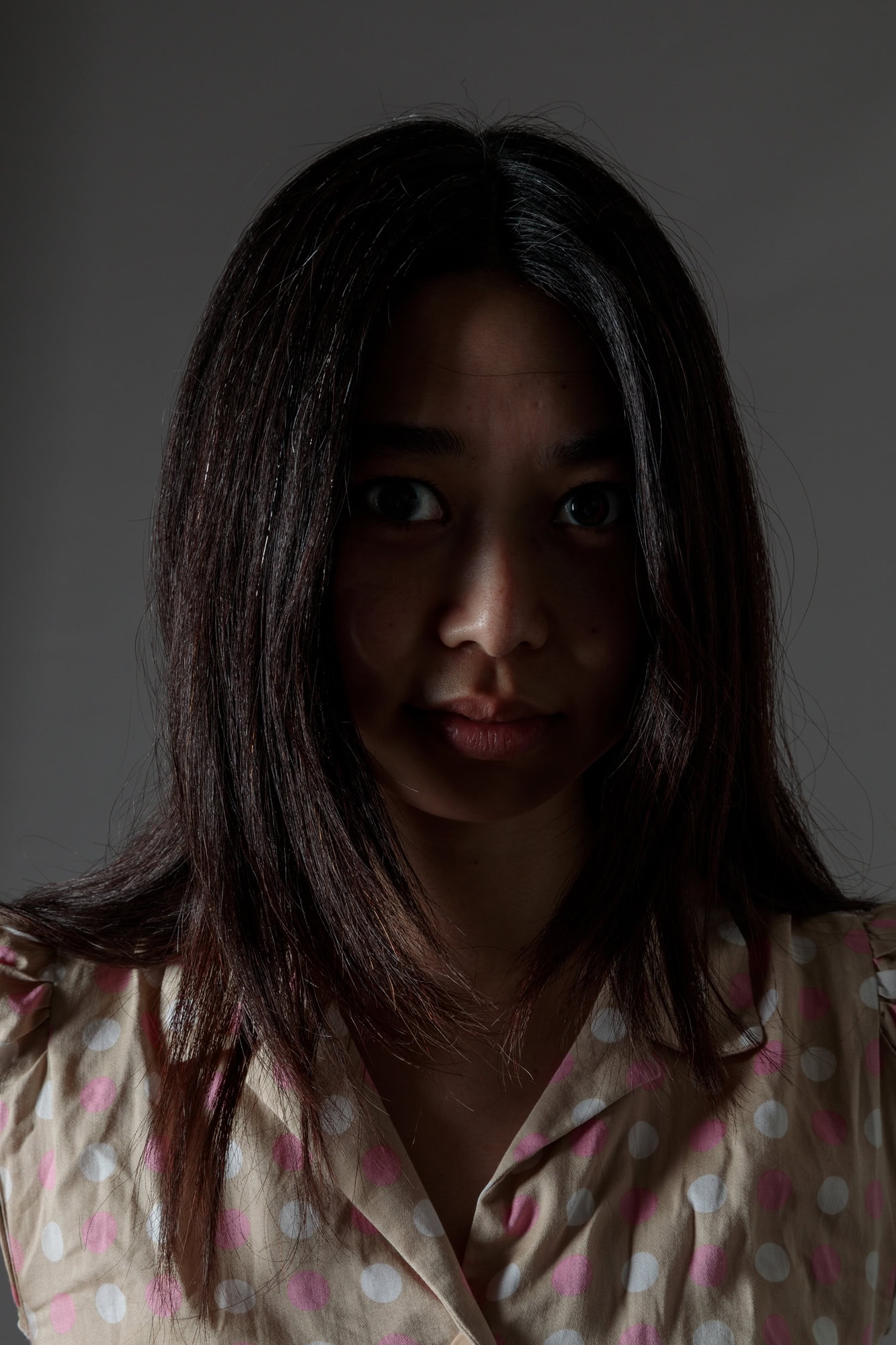 Close cropped portrait of Japanese woman. 
